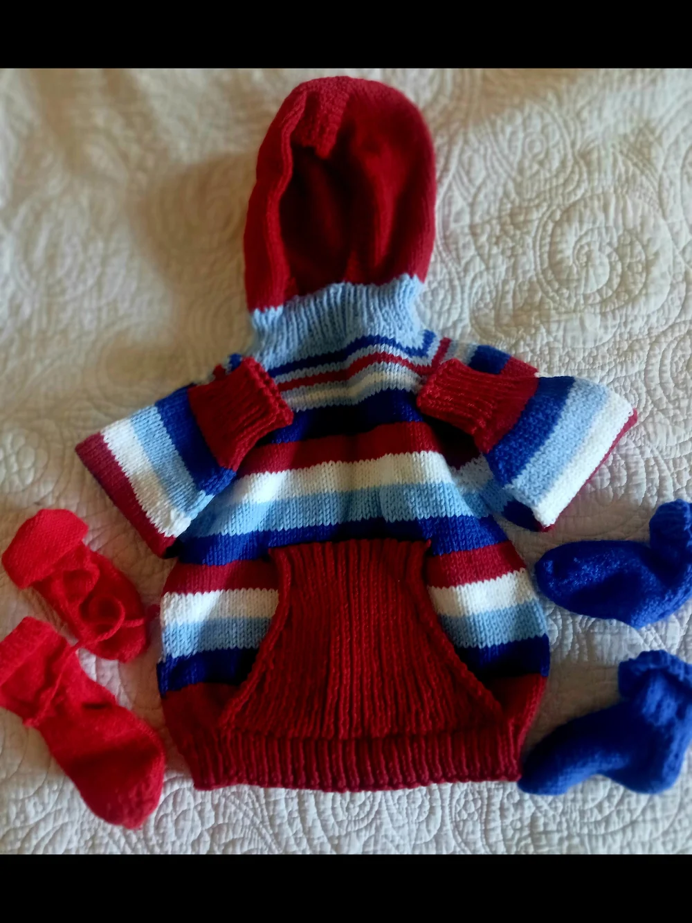Various handknit toddler winter wear